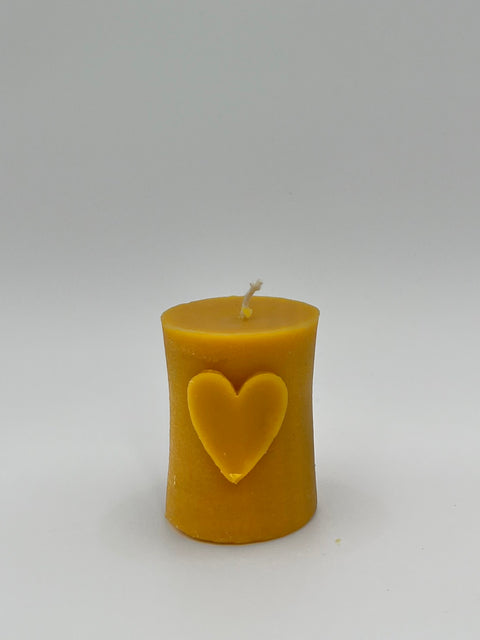 Candle cylinder with a heart